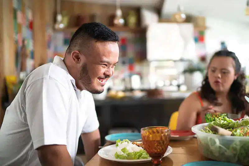 Empowering Weight Loss: A Comprehensive Guide for Individuals with Disabilities 2 Image of a disabled man and balance around nutrition to aid weight loss Bedford