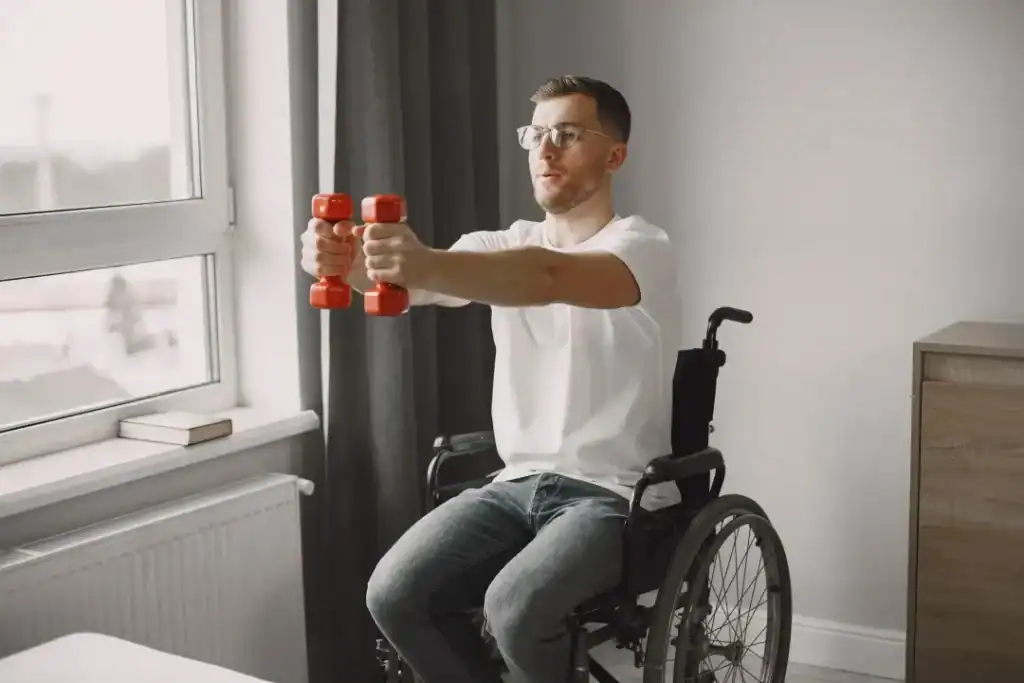 Empowering Weight Loss: A Comprehensive Guide for Individuals with Disabilities 1 Image of man doing exercise in his wheelchair to aid weight loss Bedford